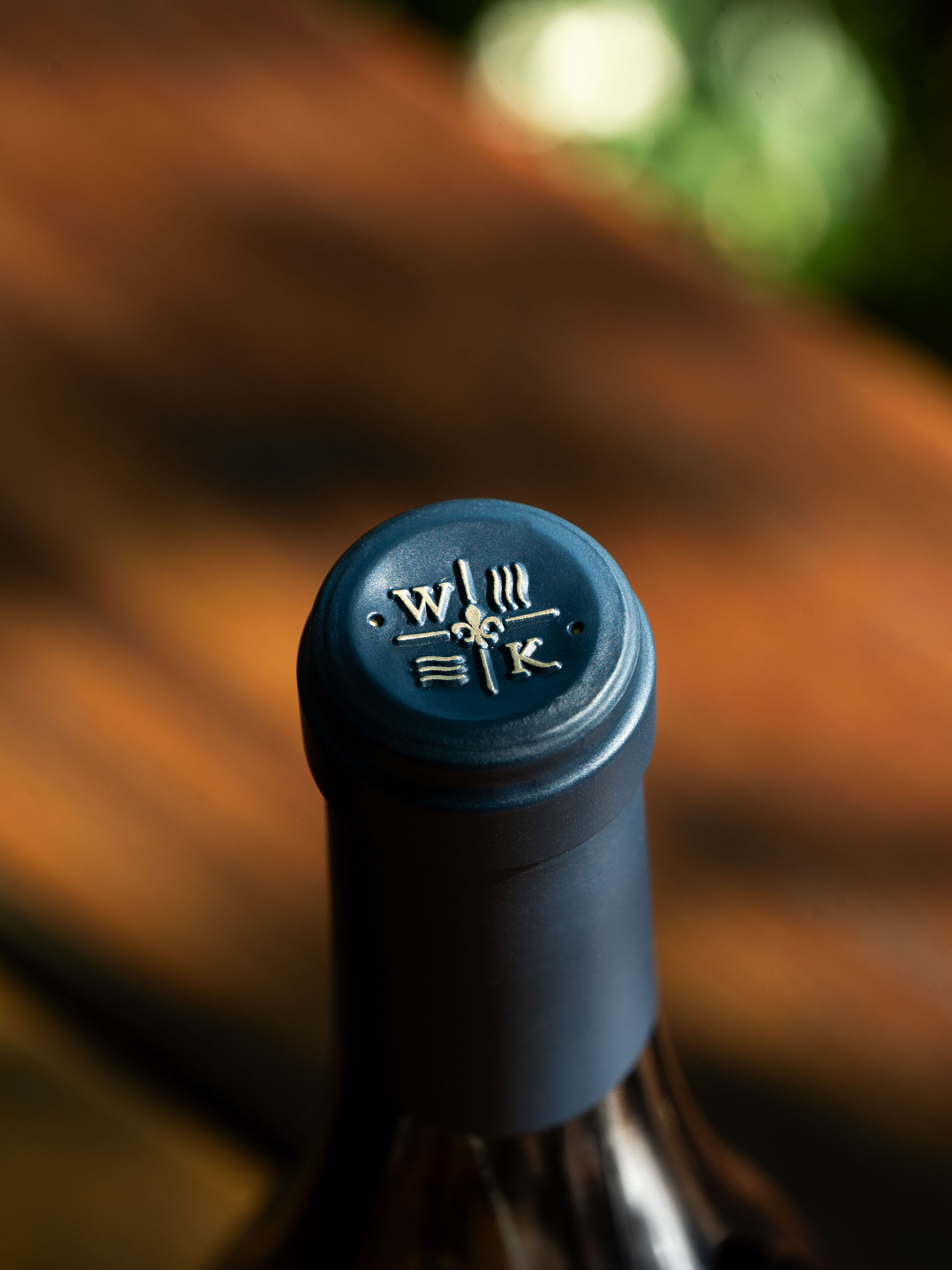Two glasses and 2 bottles of rosé sitting on a bar in the WillaKenzie Tasting room. Two glasses and 2 bottles of rosé sitting on a bar in the WillaKenzie Tasting room.