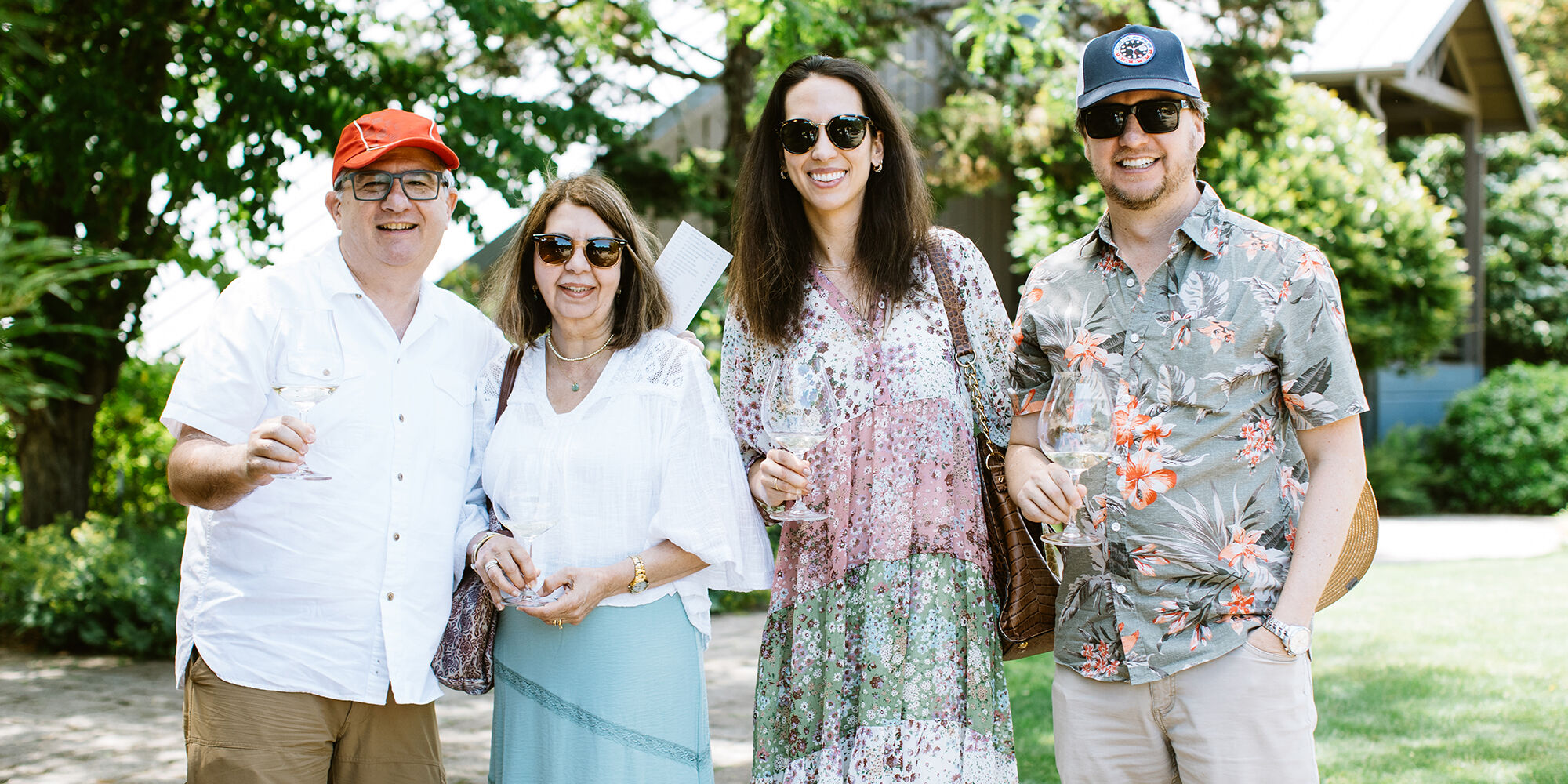 4 WillaKenzie Estate Members pose outside the Tasting Room